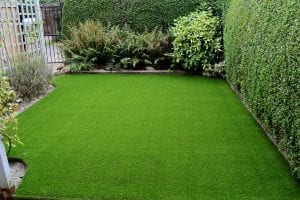 Homeguide New Artificial Turf Installation in Residential Backyard